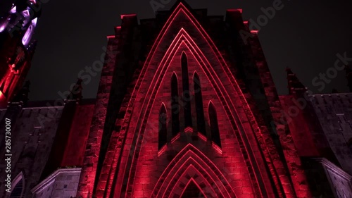 church lit with red and blue flashing lights