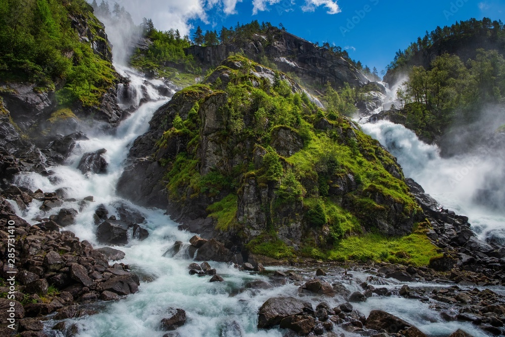 Latefossen (Latefoss) twin waterfall - one of the biggest waterfalls in Norway, nearby Odda. HDR image, july 2019