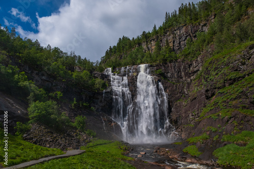Frontal view of the Skjervsfossen in summer  seen from the base. Norway. July 2019