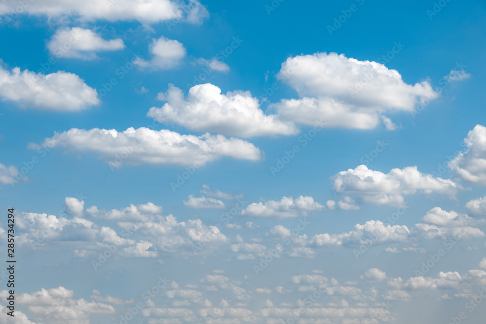 Blue sky and white clouds under the sun Blue sky and white clouds under the sun