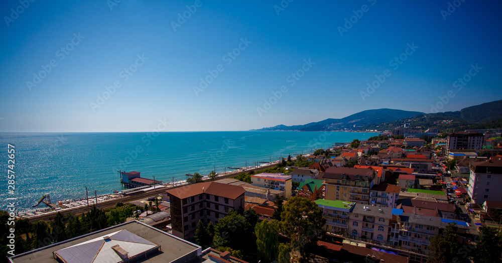 Beautiful panoramic autumn landscape at the resort city of Sochi on the Black sea coast. The view from the top.
