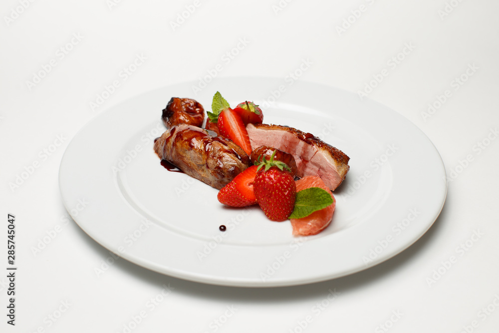 meat in sweet and sour sauce in strawberries and figs meat in sweet and sour sauce in strawberries and figs