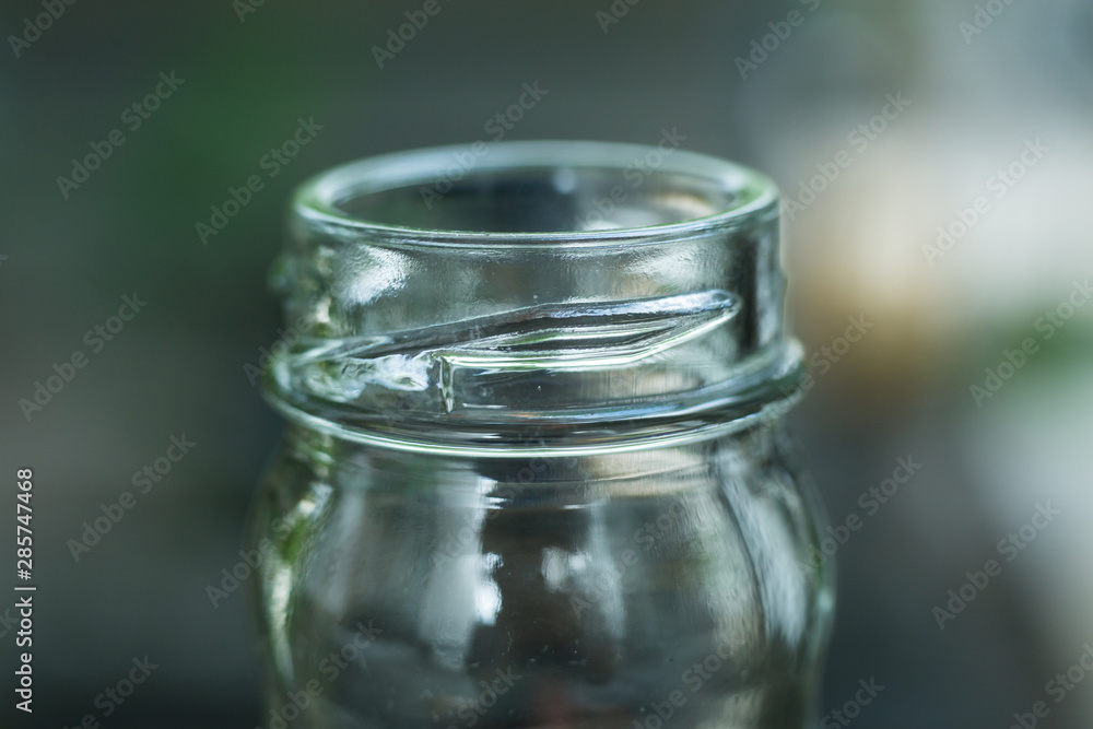 Glass of water, Bottle on bokeh grey background, Close up and Macro shot, Selective focus, Drink concept Glass of water, Bottle on bokeh grey background, Close up and Macro shot, Selective focus, Drink concept