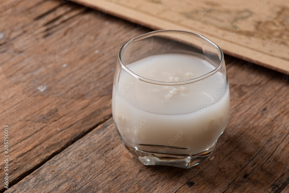 Barley water in glass with raw and cooked Barley water in glass with raw and cooked