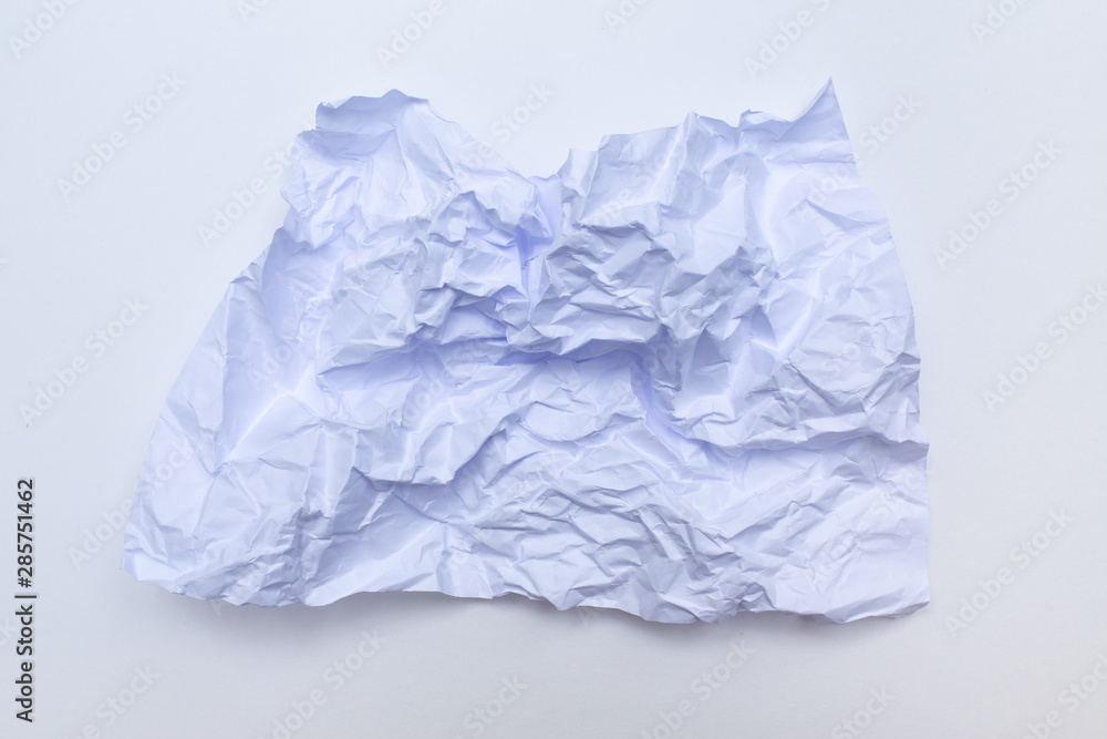 White crumpled paper on white background