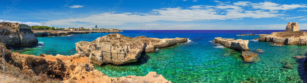 The most beautiful coast of Apulia: Roca Vecchia, ITALY (Lecce).Typical seascape of Salento: cliff and ruins of ancient coastal watchtower. - obrazy, fototapety, plakaty 
