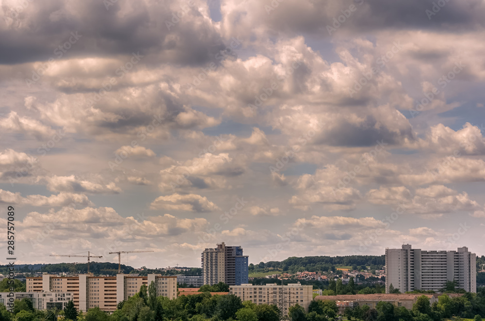 An old part of Stuttgart below a cloudy summer sky