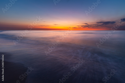Colourful sky over the north sea after sunset at the beach on Juist  East Frisian Islands  Germany.