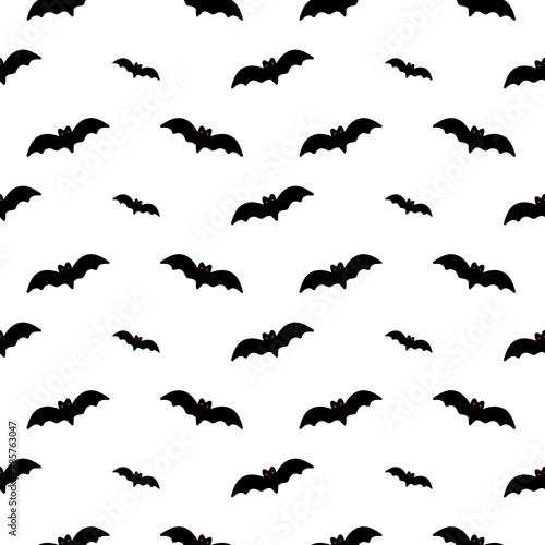 Vector seamless pattern background with bats silhouettes for international bat night or halloween design.