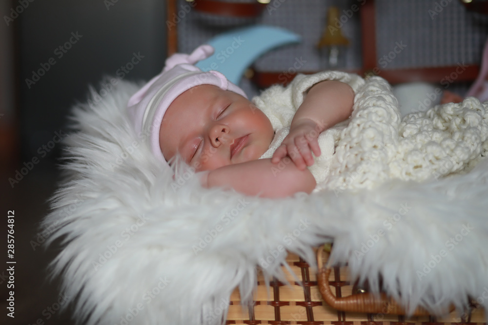 Baby newborn sleeping wrapped up in a blanket Baby newborn sleeping wrapped up in a blanket
