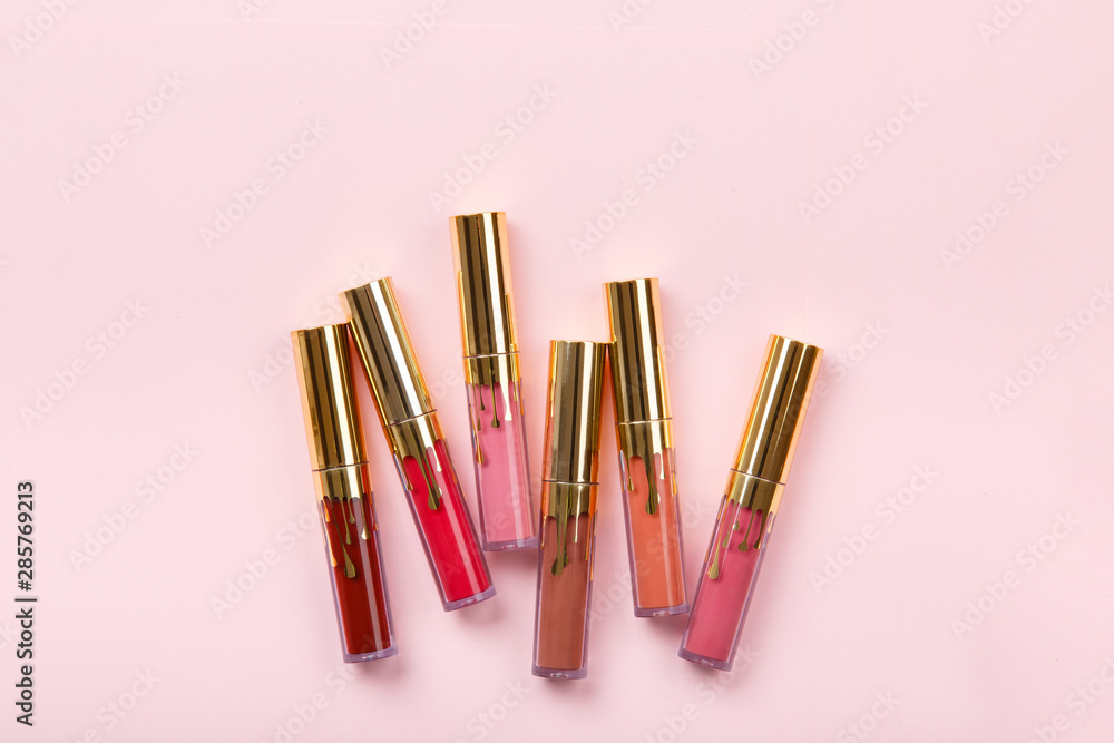 set of lipstick, lip gloss on pink background. Woman's cosmetics. Women's morning secrets. Cosmetics, lipstick. Make up collection set of lipstick, lip gloss on pink background. Woman's cosmetics. Women's morning secrets. Cosmetics, lipstick. Make up collection