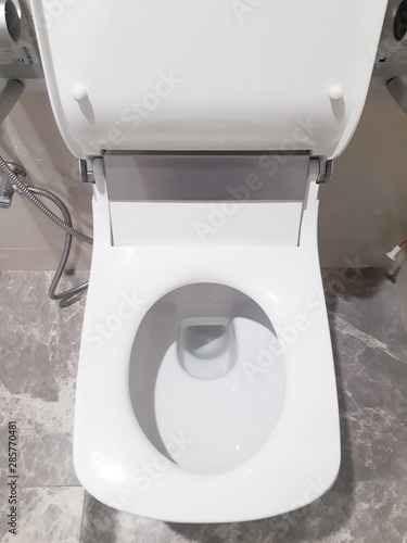 Toilet, Flushing Water, close up, flush toilet , White toilet in the bathroom, Top view of toilet bowl