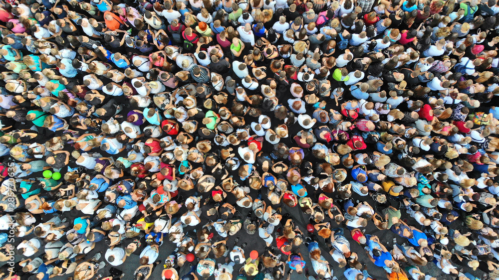Aerial. People crowd background. Mass gathering of many people in one  place. Top view. Stock Photo | Adobe Stock