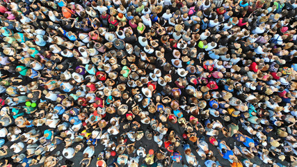 Aerial. People crowd background. Mass gathering of many people in one place. Top view.