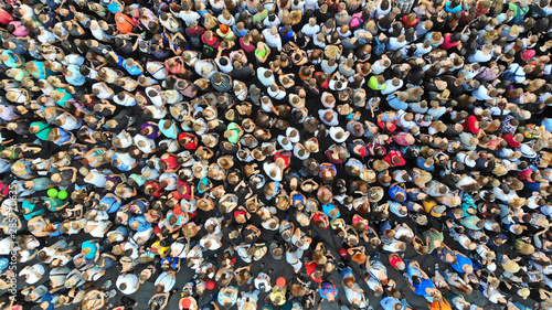 Aerial. People crowd background. Mass gathering of many people in one place. Top view.