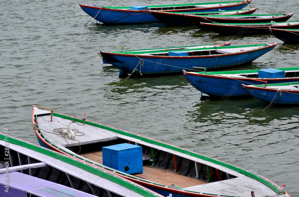 Colored boats on de Ganges river in Varanassi, India Colored boats on de Ganges river in Varanassi, India
