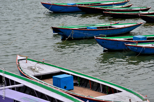 Colored boats on de Ganges river in Varanassi, India
