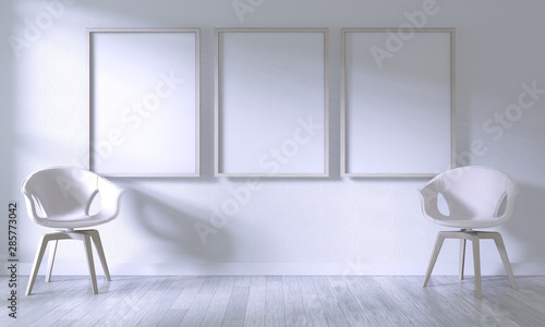 Mock up poster frame with white chair on room white wall on white wooden floor.3D rendering