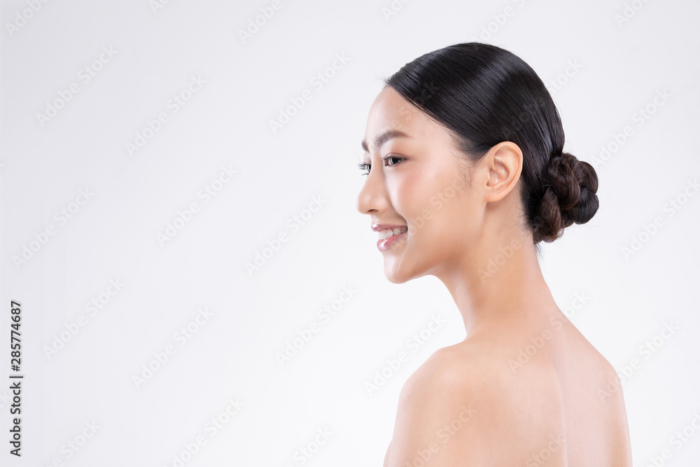 Side view of Beautiful Asian woman smile with clean and fresh skin Happiness and cheerful with positive emotional,isolated on white background,Beauty and Cosmetics Concept Side view of Beautiful Asian woman smile with clean and fresh skin Happiness and cheerful with positive emotional,isolated on white background,Beauty and Cosmetics Concept