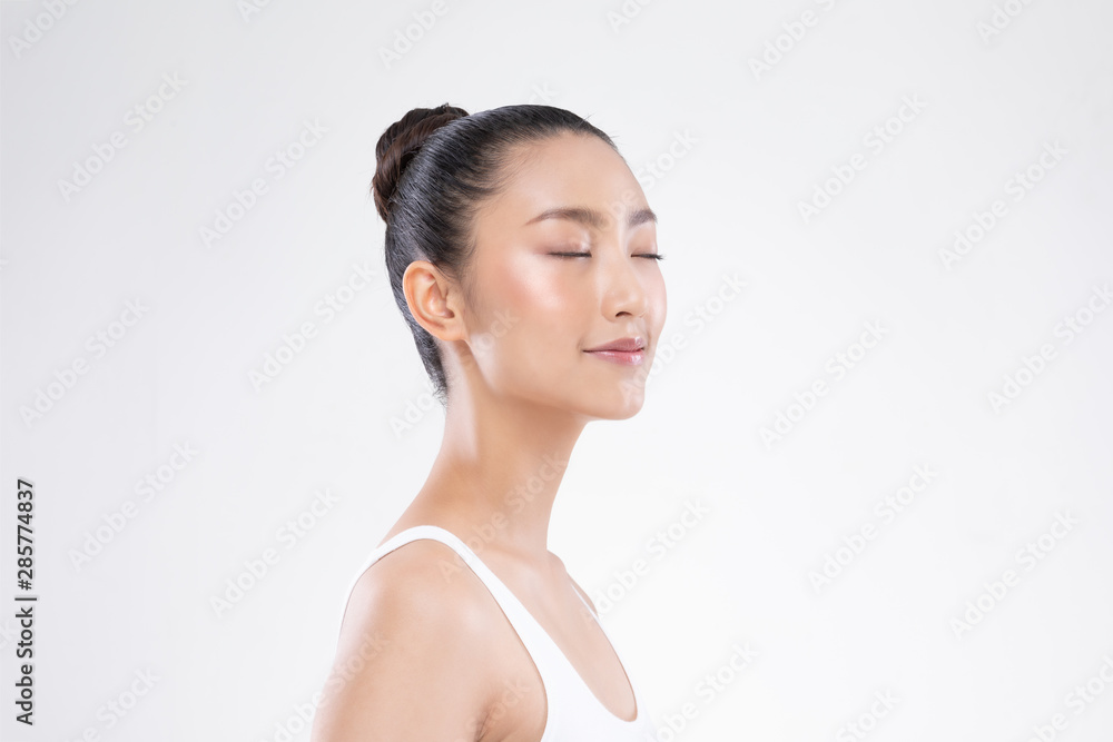 Side view of Beautiful Young Asian Woman Close her eyes smile feeling so happy and cheerful with healthy Clean and Fresh skin,isolated on white background,Beauty Cosmetology Concept Side view of Beautiful Young Asian Woman Close her eyes smile feeling so happy and cheerful with healthy Clean and Fresh skin,isolated on white background,Beauty Cosmetology Concept