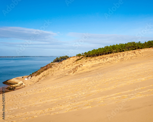 The Dune du Pilat of Arcachon in France, the highest sand dunes in Europe: paragliding, oyster cultivation, desert and beach.