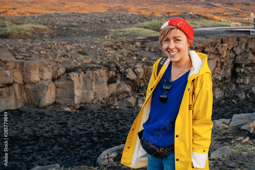 Woman traveling Iceland. In famous place between continents photo