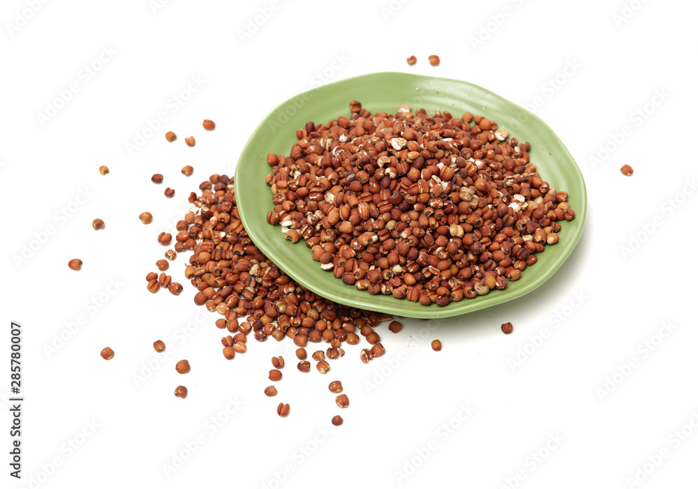 Job's tears coix lachryma jobi grain seeds on white background Job's tears coix lachryma jobi grain seeds on white background