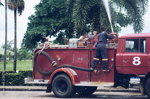 Fotografie, Tablou red fire truck in front of the house