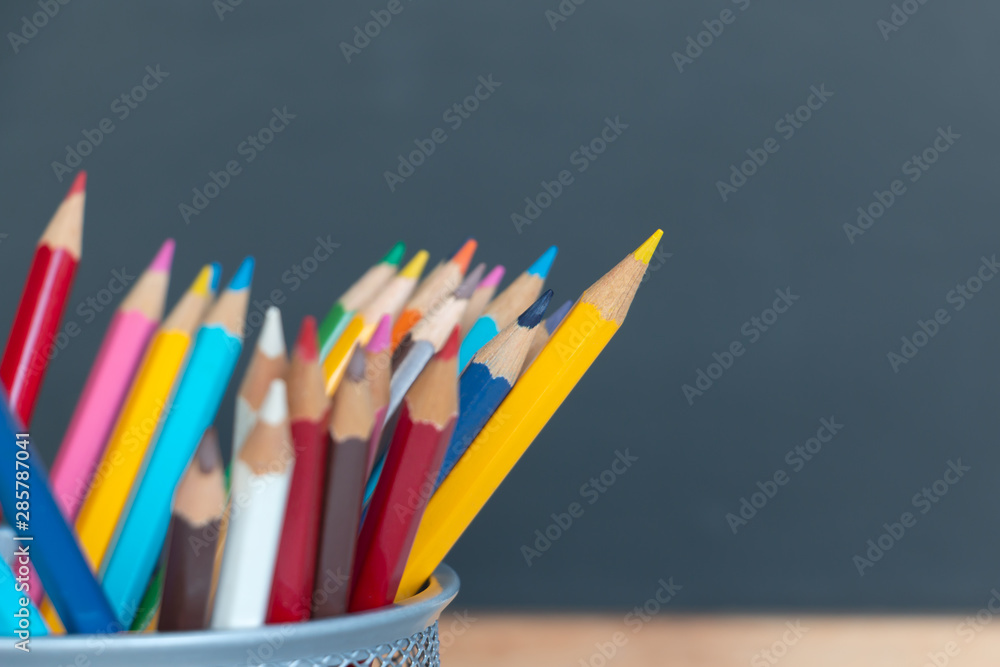 Fototapeta premium Back to school background with color pencils