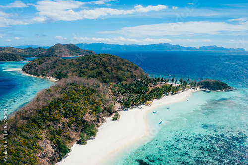 Malcapuya island in the philippines, coron province. Aerial shot from drone about vacation,travel and tropical places photo