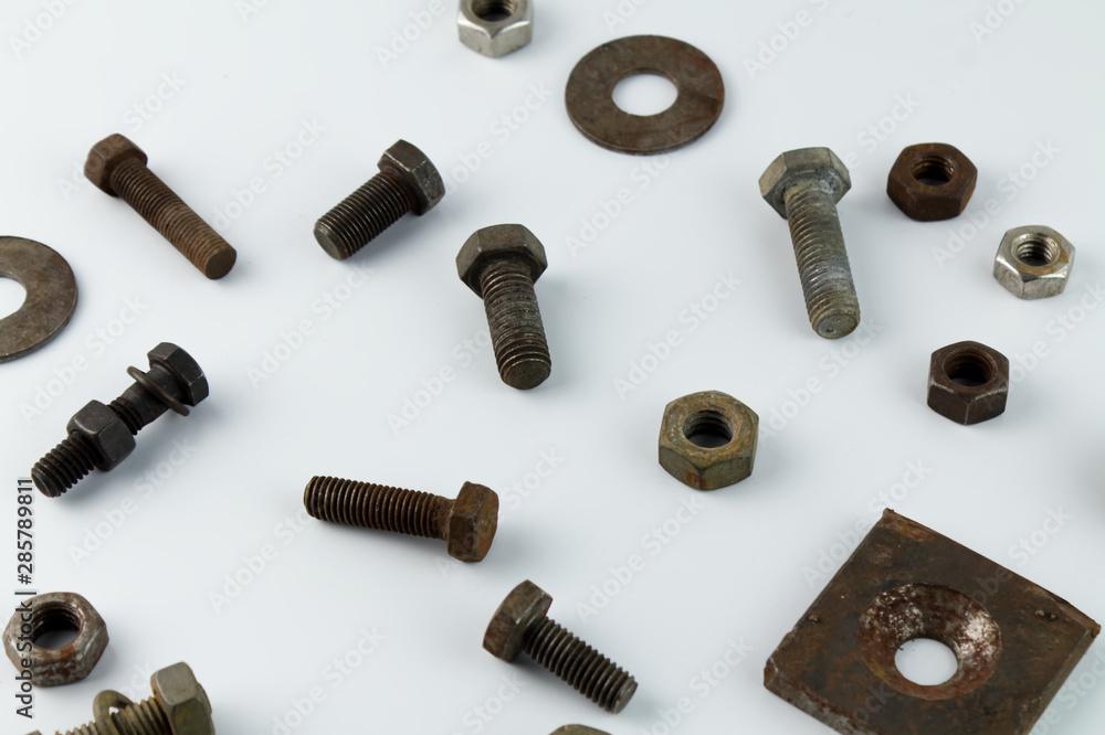 bolts and nuts on black background bolts and nuts on black background