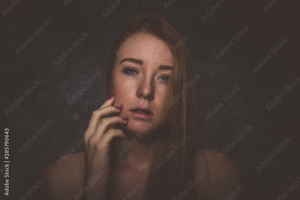 Fototapeta premium Studio portraits with red hair girl