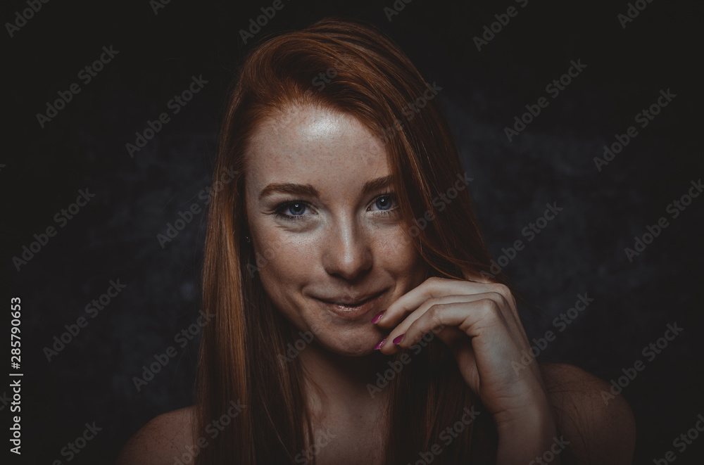 Fototapeta premium Studio portraits with red hair girl