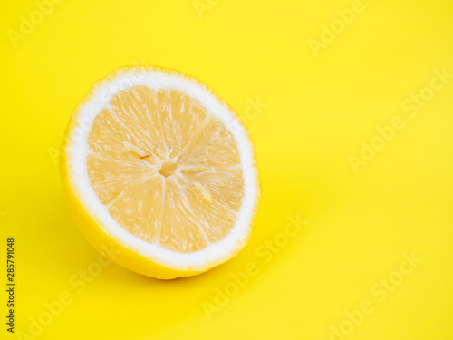 lemon on yellow background.
