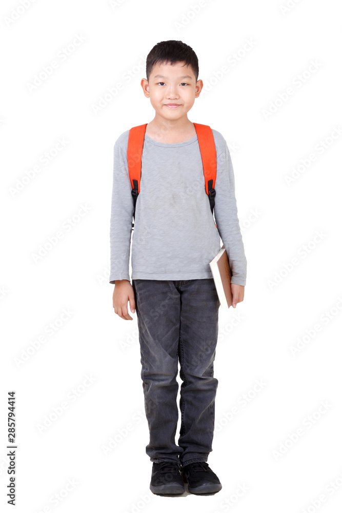 Fototapeta premium Asian Boy School kid holding book Hand up with orange backpack. Full Body isolated on White background.frantic.excited.
