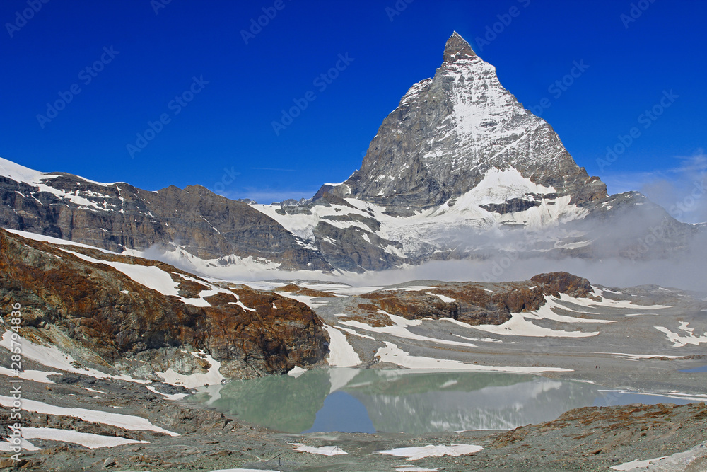Mount Matterhorn. The height of the peak is 4478 meters. View from the Swiss city of Zermatt on a sunny summer day