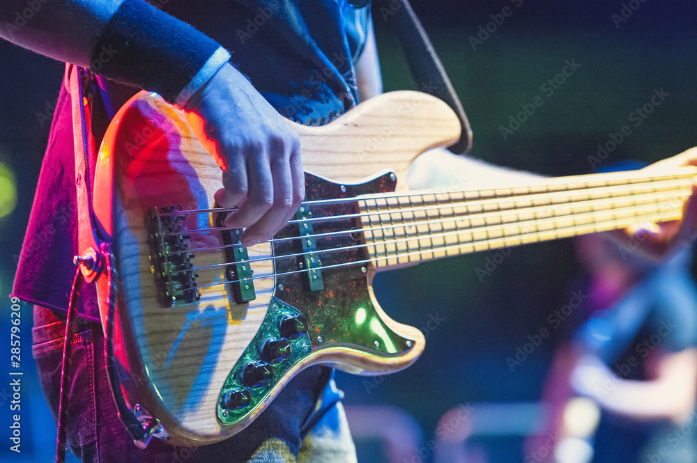 5-string bass player during a live show - obrazy, fototapety, plakaty 