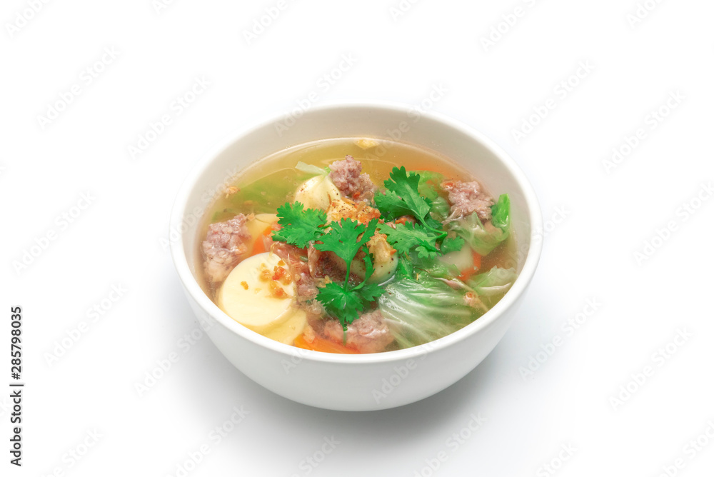 Pork Chops and tofu soup on white bowl on whitebackground Pork Chops and tofu soup on white bowl on whitebackground