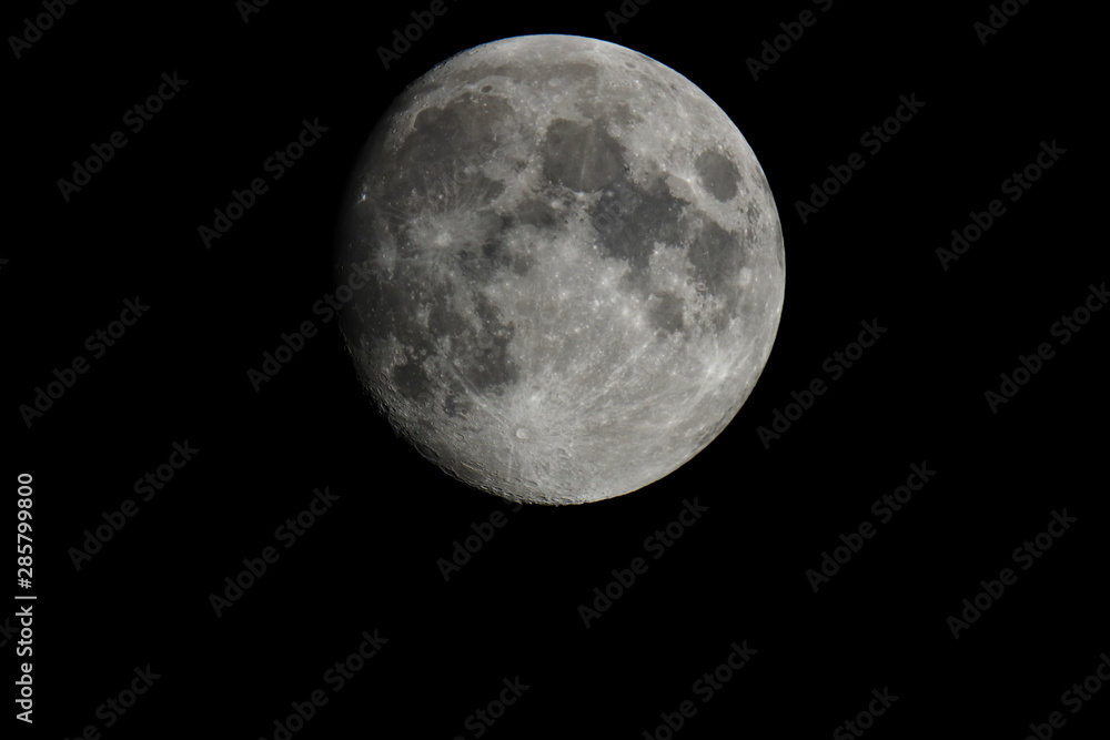 Crescent gibbous moon, with detail of its craters above the frame to add text below Crescent gibbous moon, with detail of its craters above the frame to add text below