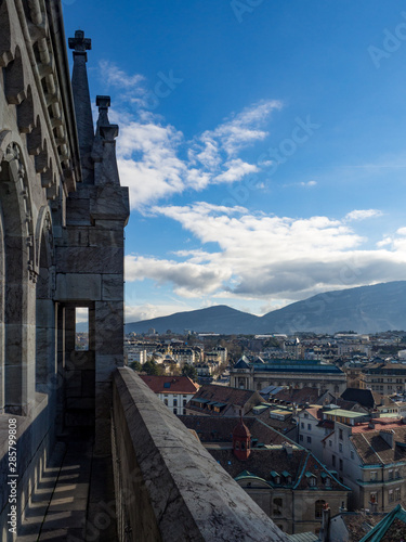 Switzerland, february 2018: Panorama of the Old City of Geneva with Lake Geneva and the fountain Jet D'eau from Cathedral of Saint-Pierre, Geneva.