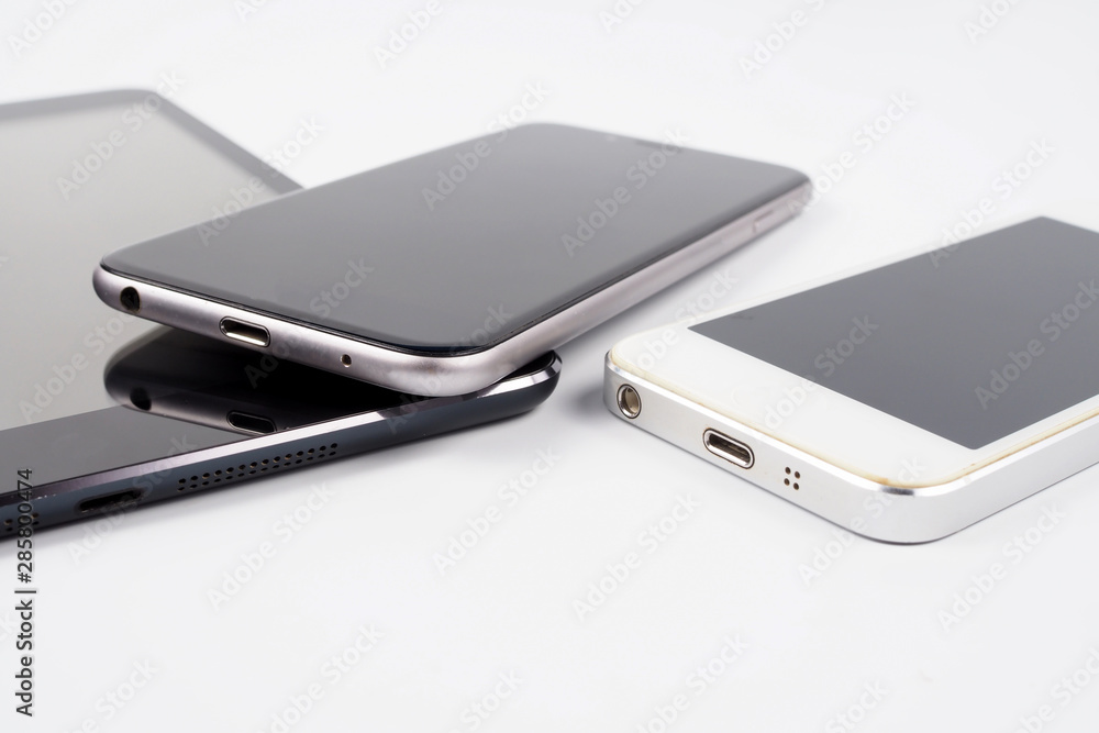 Digital tablet and smart phone on white background. Electronic devices Digital tablet and smart phone on white background. Electronic devices