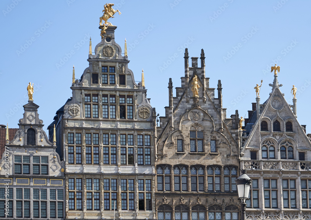 Beautiful old architecture houses in Belgium with golden statues. Beautiful old architecture houses in Belgium with golden statues.