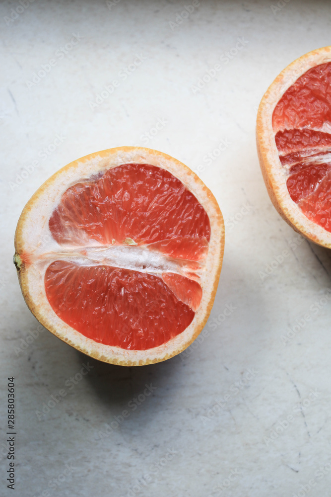Grapefruit is cut in half Grapefruit is cut in half