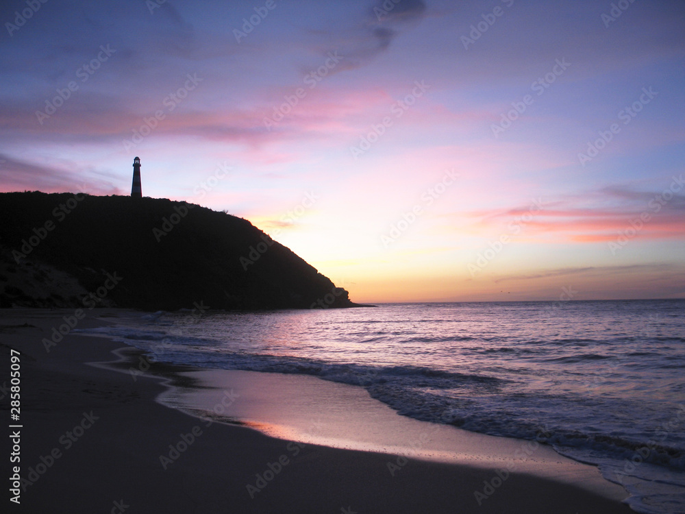 Pastel colors at sunset and lighthouse Margarita Island Venezuela