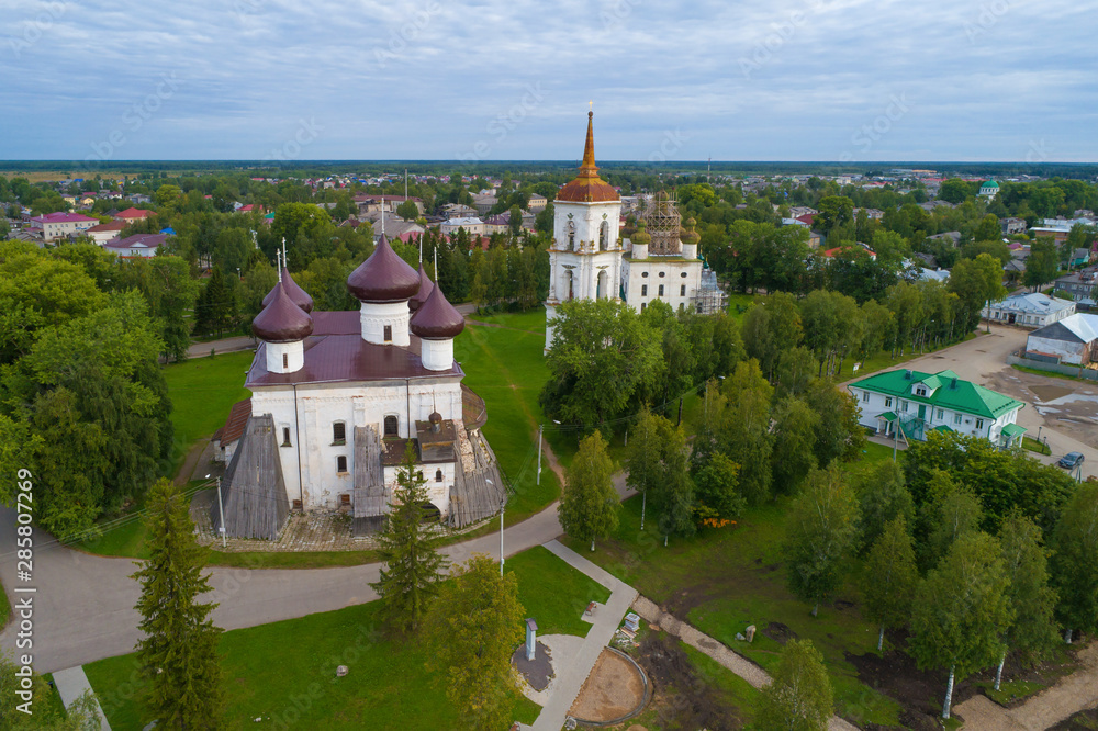 View of Christmas Cathedral with bell tower cloud August morning (shooting from quadrocopter). Kargopol, Russia