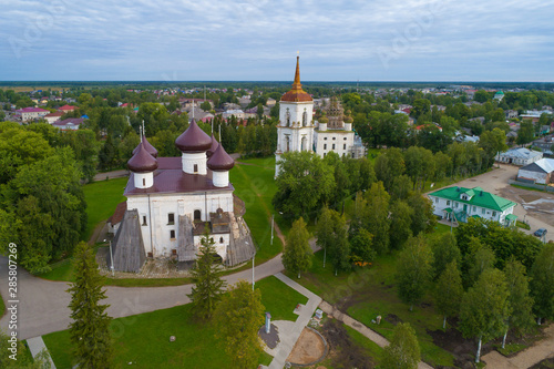 View of Christmas Cathedral with bell tower cloud August morning (shooting from quadrocopter). Kargopol, Russia