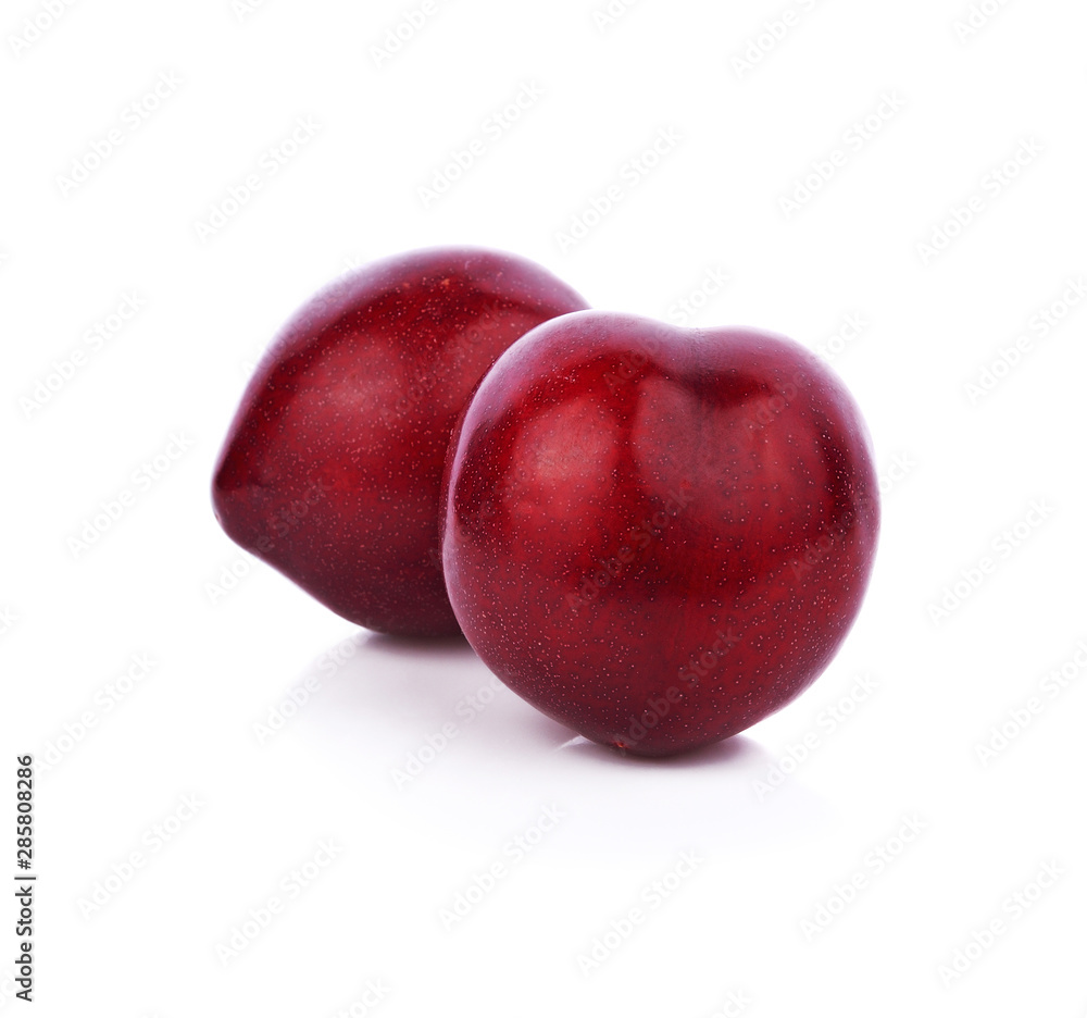 Fresh plum is isolated on white background.