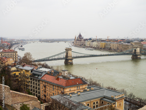 The Sz  chenyi Chain Bridge is a suspension bridge that spans the River Danube between Buda and Pest  the western and eastern sides of Budapest  the capital of Hungary.