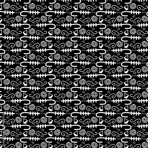 hand doodled black and white organic geometric pattern with symbols for textile  fabric  wallpaper  backgrounds  backdrops and creative surface design templates.