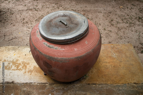 Big clay pot with steel lid